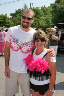 man and woman marching for breast cancer 