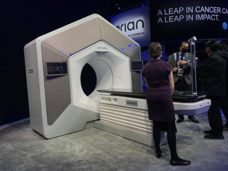 The Varian Ethos artificial intelligence (AI) adaptive radiation therapy system at ASTRO 2021. The system, released in 2019, uses the onboard imaging system to scan the patient during each treatment session and can create a new treatment plan in a couple minutes to adapt to any changes in the body or tumor size. The radiation oncologist can choose to accept, reject or modify the plan. This adaptive therapy is designed to make radiotherapy more targeted, spare more healthly tissue and enable faster therapy.