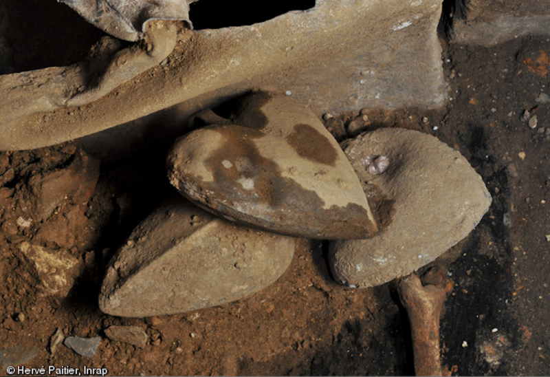 Archeological excavation of lead-preserved hearts in France.