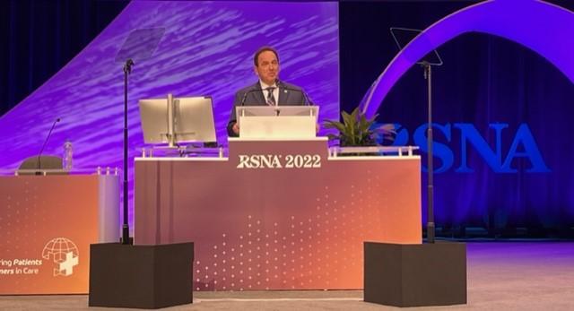 RSNA President Bruce Haffty, MD, MS, delivers his Plenary Address on the value of imaging at the close of the first day of RSNA 108th Annual Meeting on Nov. 27, 2022.