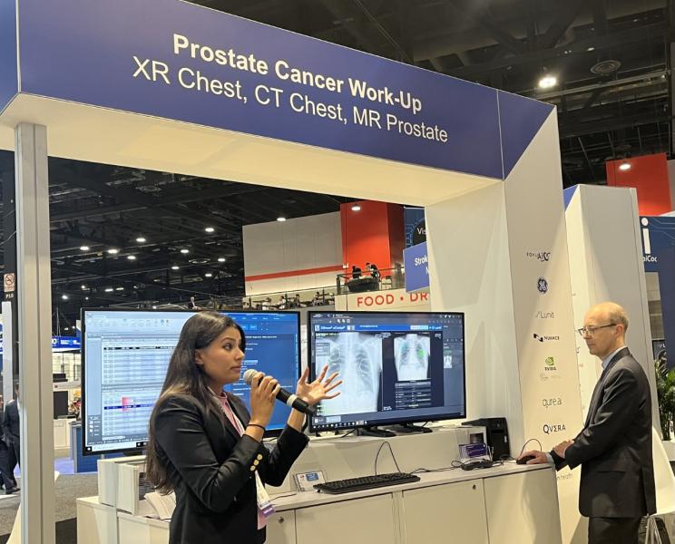 A special Imaging AI in Practice demonstration took place on Nov. 29, and featured radiology residents, including Alysha Dhami, MD, Stanford University School of Medicine, shown here explaining AI’s role in patient diagnoses and treatment to a captive audience.