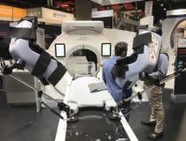 Siemens Healthineers Go Open.Pro CT system optimized for use in radiation therapy. Shown with patient positioning system mounted to the coach.