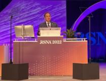 RSNA President Bruce Haffty, MD, MS, delivers his Plenary Address on the value of imaging at the close of the first day of RSNA 108th Annual Meeting on Nov. 27, 2022.