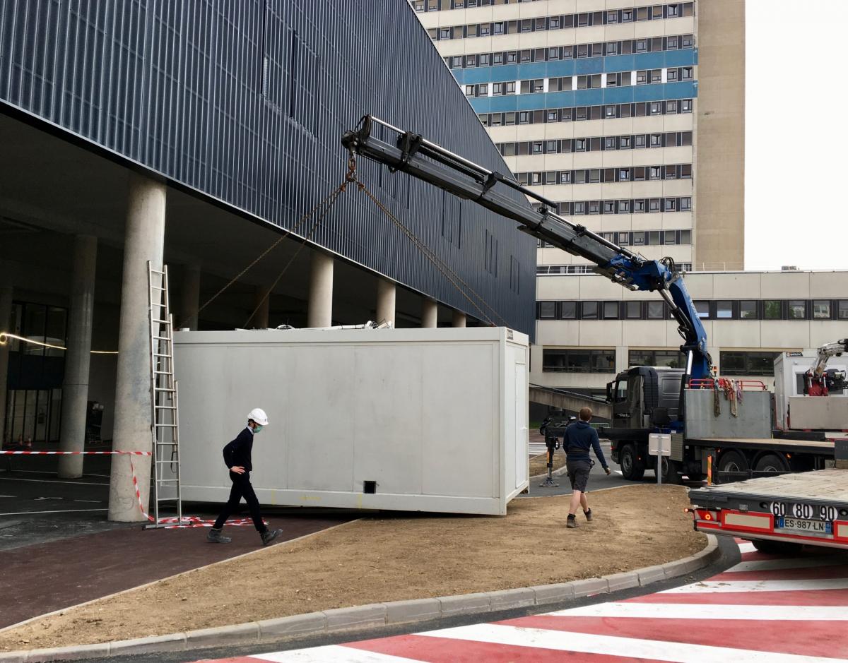 A cut-away view of the two cabins that compose the "CT-in-a-box" solution from GE to rapidly deploy CT scanners at hospitals amid a COVID surge. The CT room is completely separate from the control room to aid in sanitation and keeping technologists away from COVID patients.