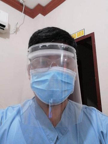 A radiology technologist Dodge Moises made his own personal protective equipment (PPE) face shield due to a severe shortage of PPE at Sen. Gerardo M. Roxas Memorial District Hospital in Iloilo City, Philippine. He used X-ray film that had gone bad with the emulsion stripped off, foam packing material, elastic and a glue gun to make own face shields for the techs. They were only issued 2 pairs of PPE for the duration, so they had to supplement. Photo by Dodge Moises.