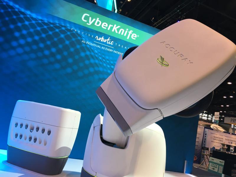 Accuray CyberKnife robotic arm radiation therapy treatment system on display on the expo floor of ASTRO 2019 this week. The counter looking area has various aperture collimators to shape the size of the photon beams. #ASTRO19 #ASTRO2019 #ASTRO
