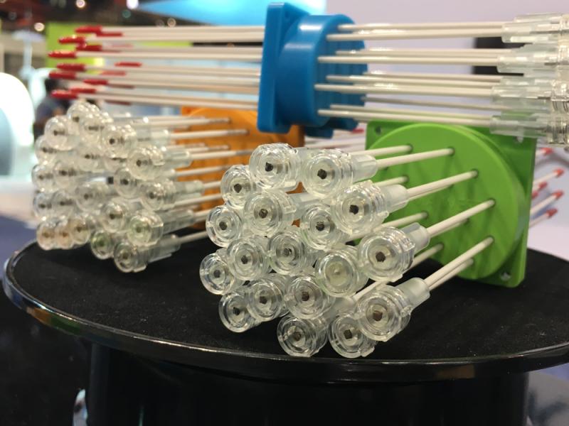 These are brachytherapy seed applicators on display at the ASTRO 2019 meeting by the company Liberty Medical.  The catheters have caps on the end to protect the sharp points required to push them I to the soft tissue of a prostate or other organs. The photo with the red tips has one can removed to show the sharpened end.#ASTRO19 #ASTRO2019 #ASTRO
