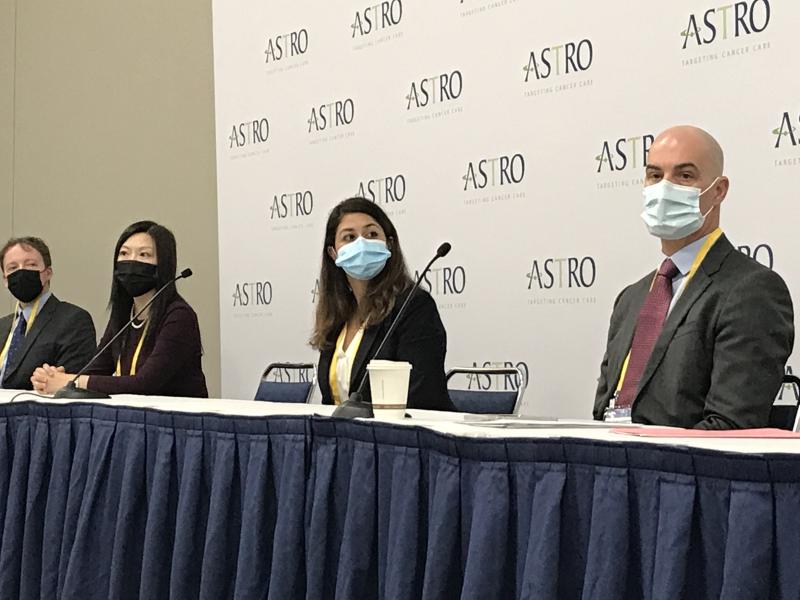 An ASTRO 2021 press conference where the presenters are masked prior to giving their presentations. COVID guidelines for masking and requiring vaccinations were enforced at the annual meeting. Efforts were also made to socially distance chairs in sessions. 