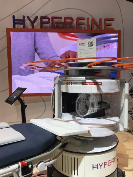 The Hyperfine Swoop portable MRI system on display at RSNA 2021. The company performed live MRI brain scans on anyone who wanted to be scanned on the show floor. The system is well below 1T and is self shielded so it was safe top operate on the floor. The system has FDA clearance and is designed for use in patient rooms and in the emergency department. 