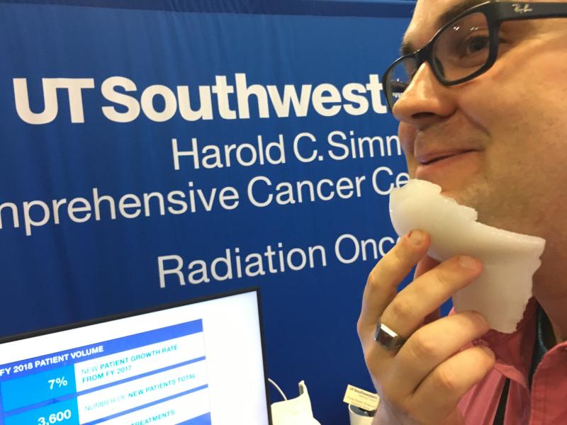 The University of Texas Southwest uses a 3-D printing lab to custom build radiotherapy bolluses for specific patients. This example is a silicone bollus for cancer in the jaw. They 3-D printed the mold from the patient CT scan. #AAPM #AAPM19 #AAPM2019