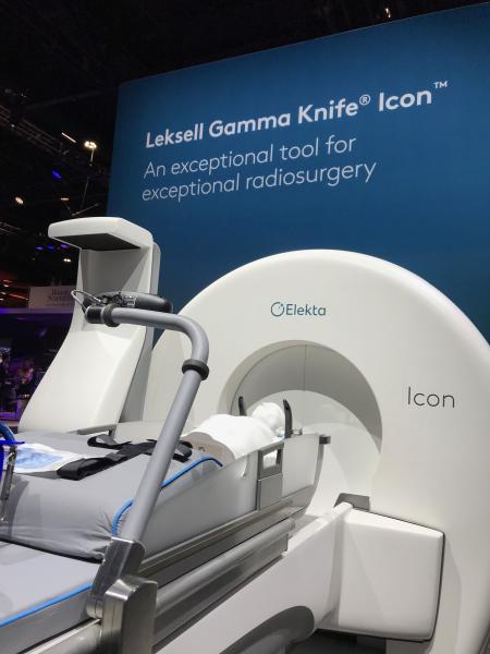 The Elekta’s Laksell Gamma Knife Icon cobalt-60 system at ASTRO. The shield doors on the system are closed when not in use because the cobalt “beam” is always on. The system uses 192 cobalt sources mounted on movable paddles. These move over holes of a fixed collimator to attenuate the dose the patient receives. It also has an attached 4D cone beam CT imaging system that folds out of the way.