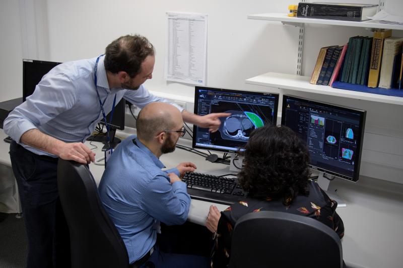 Chris Walker, head of radiotherapy physics, with the team at NCCC.