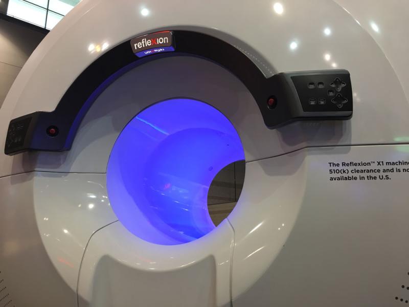 This is the Reflexion positron-emission tomography, computed tomography (PET-CT) system combined with a radiotherapy linac in a single gantry. The system offers a new approach to real-time adaptive therapy. The vendor has 12 sites doing research on this technology and the first operational system for first-in-human use will be shipped in the first part of 2020. The technology may eliminate the need for respiratory gating, treatment margins and allow better tumor targeting. #ASTRO19 #ASTRO2019 #ASTRO