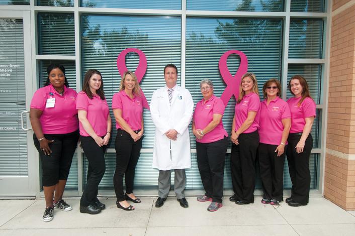 Pictured: Keith Newbrough, M.D., (center) and staff at Sentara Princess Anne Comprehensive Breast Center.