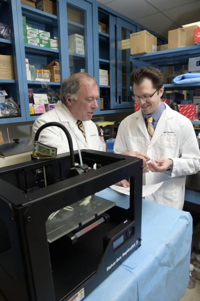Physicians at North Shore University Hospital/Feinstein Institute for Medicine in Manhassett, N.Y., use a 3-D printer to assist with medical cases.