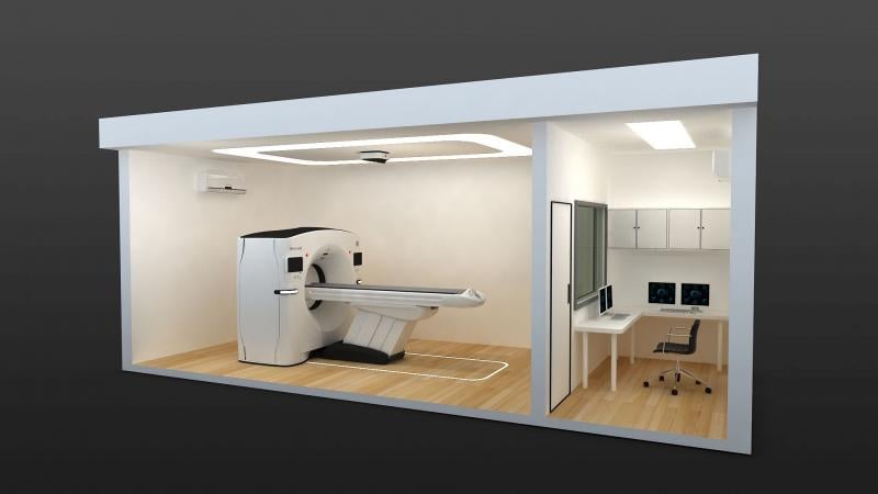 A cut-away view of the two cabins that compose the "CT-in-a-box" solution from GE to rapidly deploy CT scanners at hospitals amid a COVID surge. The CT room is completely separate from the control room to aid in sanitation and keeping technologists away from COVID patients.
