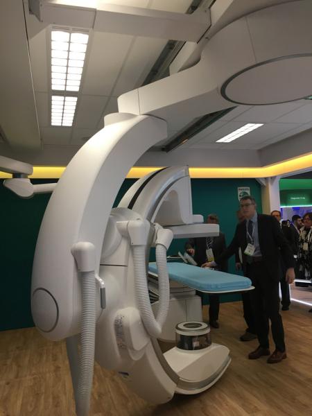 This is the latest interventional lab angiography system shown by Philips Healthcare at the 2019 Radiological Society Of North America (RSNA) meeting. The Azurion 7 Flex Arm has an extra articulated arm that offers additional range of movement in the cath lab. It gained FDA clearance in early 2019 and already has about 25 installs in the U.S.  The extra arm offers 2.3 meters of lateral movement so the gantry can be parked out of the way.