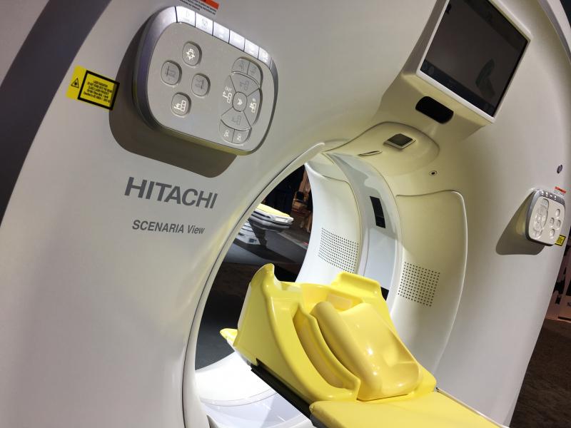The Hitachi Scenaria View CT scanner on display at the 2019 Radiological Society of North America (RSNA) meeting in December. This workhorse 64 or 128 slice CT system, and Hitchai's portfolio of MRI and ultrasound systems, is attracting the attention of Fujifilm, which does not have some of these technologies. Combined, the new new portfolio may help Fufifilm capture a parger portion of international radiology market share. Photo by Dave Fornell.
