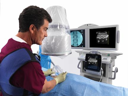 GE's OEC 9900 Elite mobile C-arm and Venue 40 mobile hybrid suite combines an ultrasound system with a mobile C-arm system for an office based interventional room.