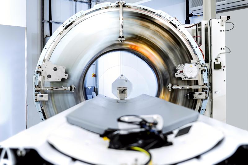 The Siemens Naeotom Alpha is the first commercialized photon-counting CT scanner. It gained FDA clearance Sept. 30, 2021. The image shows the system undergoing phantom testing with the outer covers off, showing the motion of the X-ray source and detector ring. Image by Deutscher Zukunftpreis/Ansgar Pudenz.