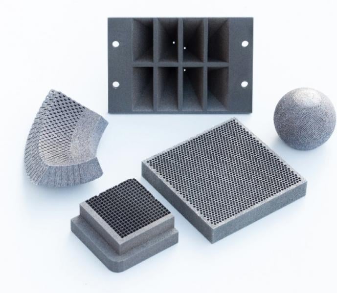 Examples of complex 3-D printed tungsten prototypes formed by additive manufacturing techniques.