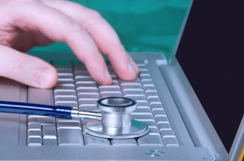 computer with stethoscope stock image 