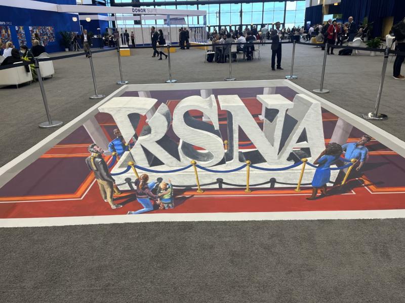A top To Do for RSNA 2022 attendees was a stop at Chicago painter, muralist and fine artist Nate Baranowski’s 3-D mural where radiologists took the opportunity to pose for pictures commemorating their annual meeting experience.