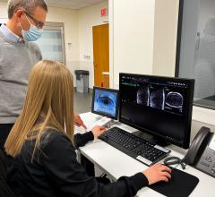 MRI technologist Heather Hermiller collaborates with Orlando Simonetti during an MRI at The Ohio State University Wexner Medical Center. Simonetti’s research was instrumental in designing a new FDA-approved MRI machine that expands access to patients who cannot get into traditional MRI machines.