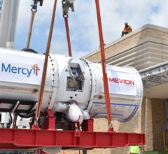 The 15-ton compact accelerator is lifted into the David C. Pratt Cancer Center at Mercy St. Louis. (Photo: Business Wire)