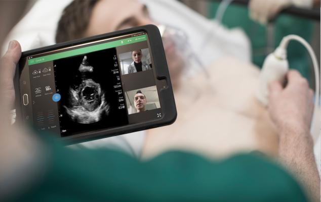 The Philips Lumify point-of-care ultrasound (POCUS) system assessing a patient in the emergency room combined with telehealth to enable real-time collaboration with other physicians.