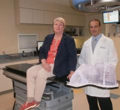 The high-level precision afforded by the Protura Robotic Patient Positioning System made all the difference in cancer treatment for patient Kathy Kelly, shown with her doctor, Joseph Bargellini.