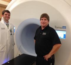 Left, Robert Staton, Ph.D., medical physicist, and Michael Brown, RTT