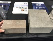 Shielding Construction Solutions Vault Builders showed examples of its specialized bricks made from high density concrete mixed with iron ore, and/or steel pellets. The image shows a comparison of bricks side-by-side including one of the vendor’s that weights 20 pounds and it has the shielding equivalent to three lower density standard bricks. These vault brick systems also come in interlocking curved edge blocks to add stability and prevent gaps where radiation beams could penetrate the walls.