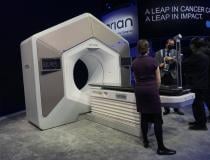 The Varian Ethos artificial intelligence (AI) adaptive radiation therapy system at ASTRO 2021. The system, released in 2019, uses the onboard imaging system to scan the patient during each treatment session and can create a new treatment plan in a couple minutes to adapt to any changes in the body or tumor size. The radiation oncologist can choose to accept, reject or modify the plan. This adaptive therapy is designed to make radiotherapy more targeted, spare more healthly tissue and enable faster therapy.