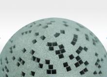 Complex 3-D printed tungsten prototype formed by additive manufacturing by Wolfmet. 3D printed tungsten.