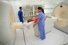 The Philips Ingenuity TF PET/MR system uses two separate gantries connected with a rotating table platform.